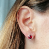 Red zirconia stud earrings. Handmade with silver