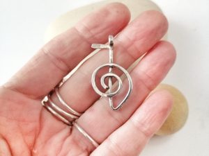 This Cho Ku Rei silver pendant is hand made with sterling silver wire and gives protection and increases healing processes