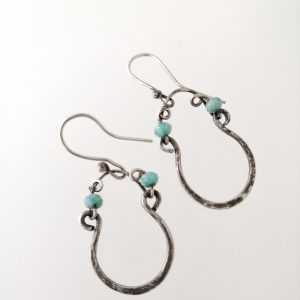 Silver dangle earrings made with wire and crystal beads