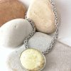 Yellow turquoise silver oval silver pendant with byzantine chain necklace. Statement jewelry with a classic touch.