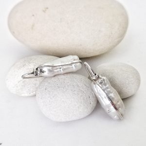 modern mother pearl hook earrings. Made with silver, original and artistic