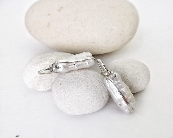 modern mother pearl hook earrings. Made with silver, original and artistic