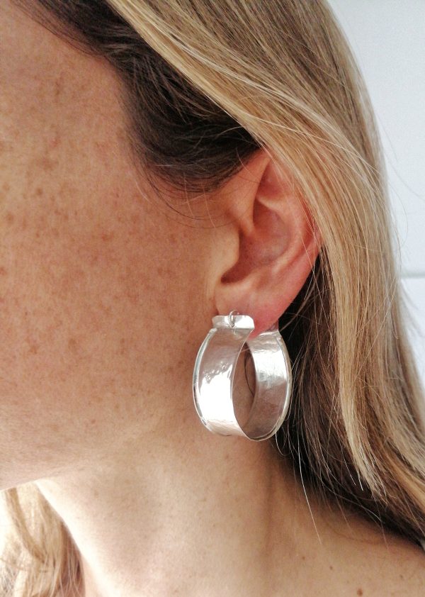 Chunky hoop silver earrings. Ideal for a gift or for women any age. Classic, yet modern jewelry.